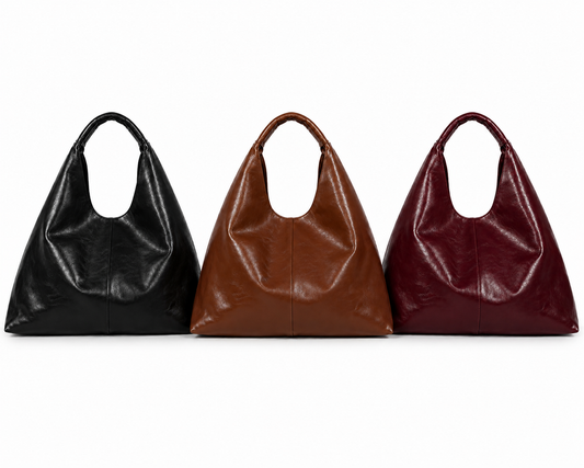 BOLSO TOTE GRANDE, EN CUERO SINTÉTICO CON BOLSILLOS INTERNOS.