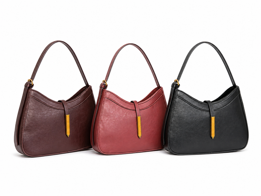 BOLSO HOBO EN CUERO SINTÉTICO, CON CORREA DE MANO AJUSTABLE Y BOLSILLO INTERNO.